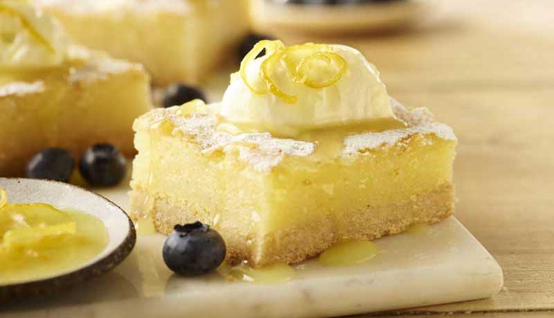 Lemon Bars with Cream and Blueberries